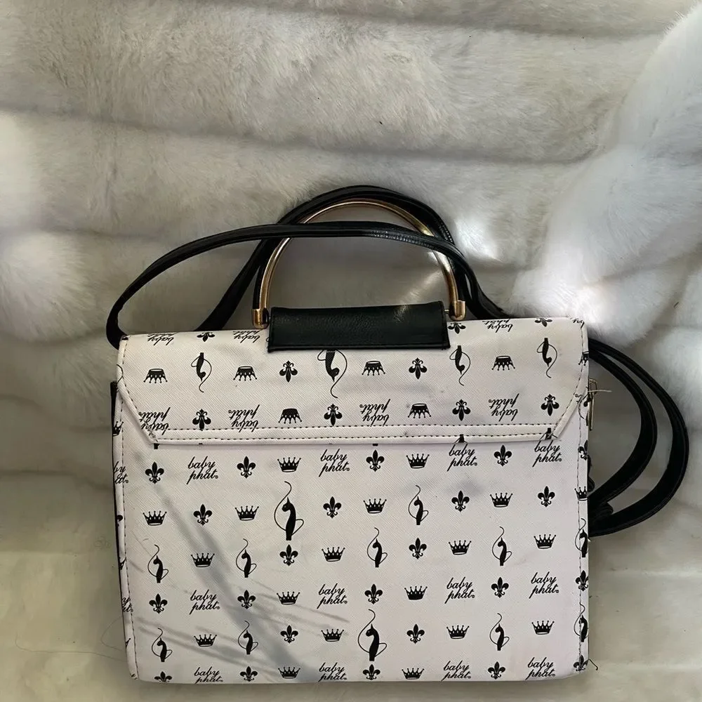 Baby Phat black and white logo satchel/shoulder bag with gold tone accent.